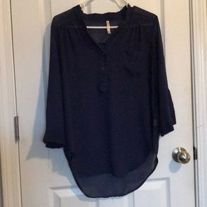 Navy blue see through shirt.